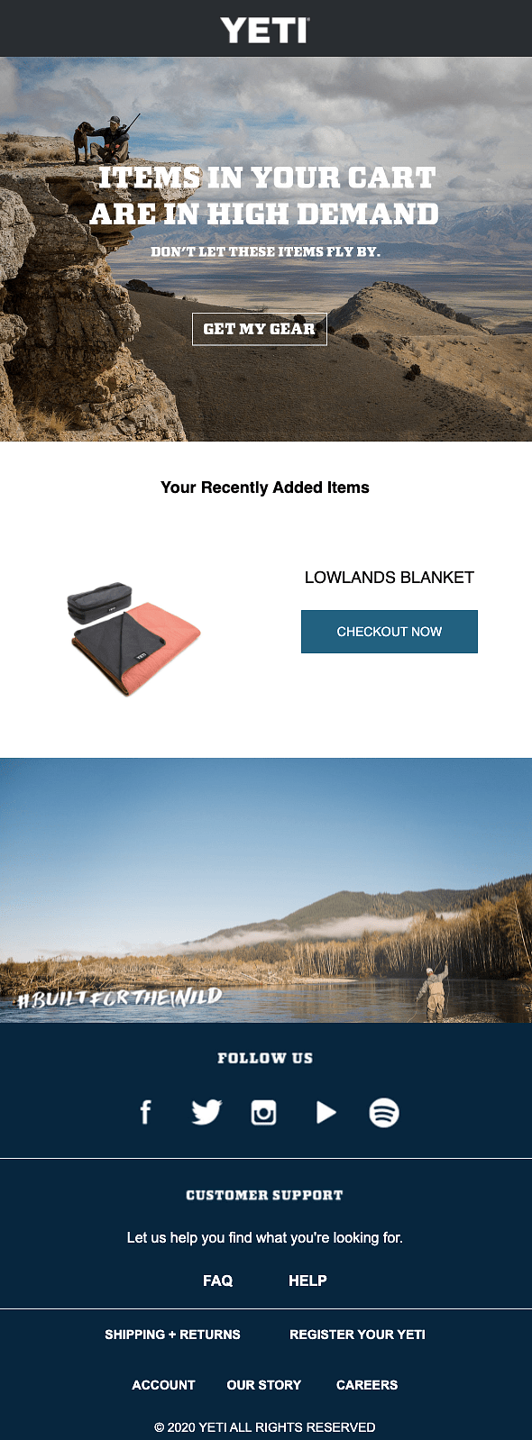 A YETI product advertisement showcases a black and gray lowlands blanket, displayed with items in a cart above a blue-toned natural landscape.