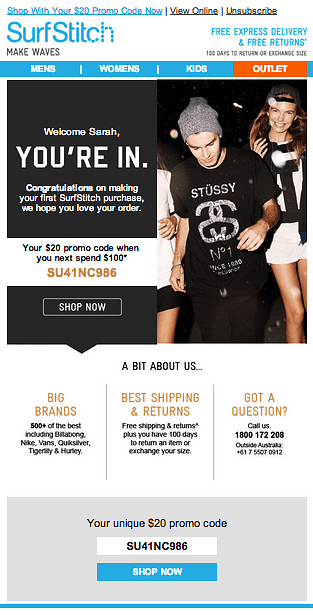 A webpage for SurfStitch, a clothing retailer, displays a black-and-white photo of a man in a black t-shirt and gray beanie, holding a phone, with a “YOU'RE IN” message and a “SHOP NOW” button. Text highlights “BIG BRANDS,” “BEST SHIPPING & RETURNS,” and “GOT A QUESTION?” with promo codes and shipping information.